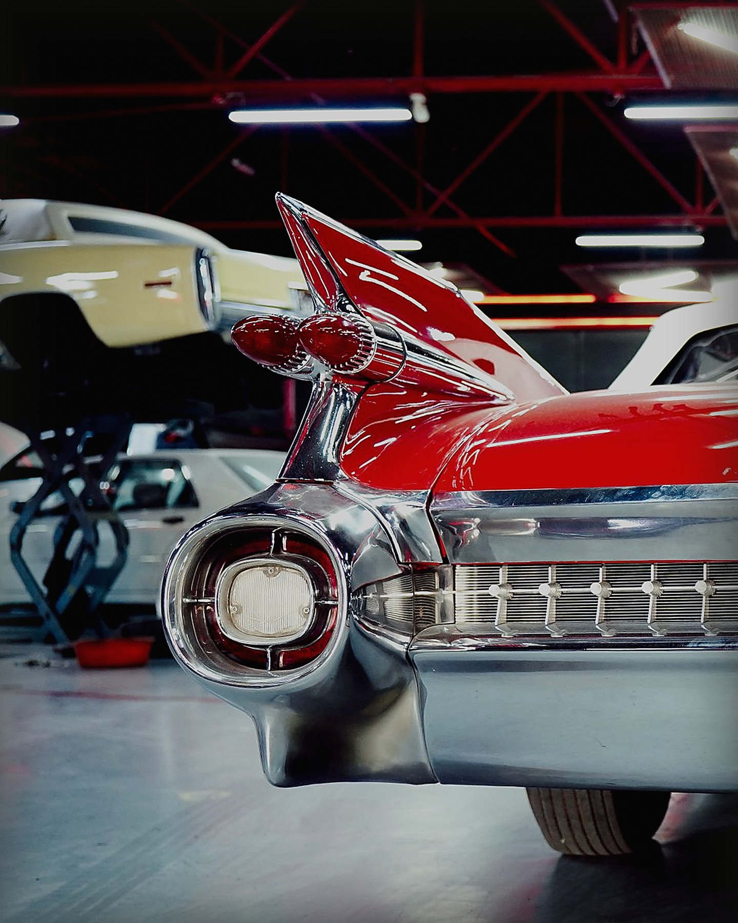Chrome and red tail-fin detail on a 1950s classic car