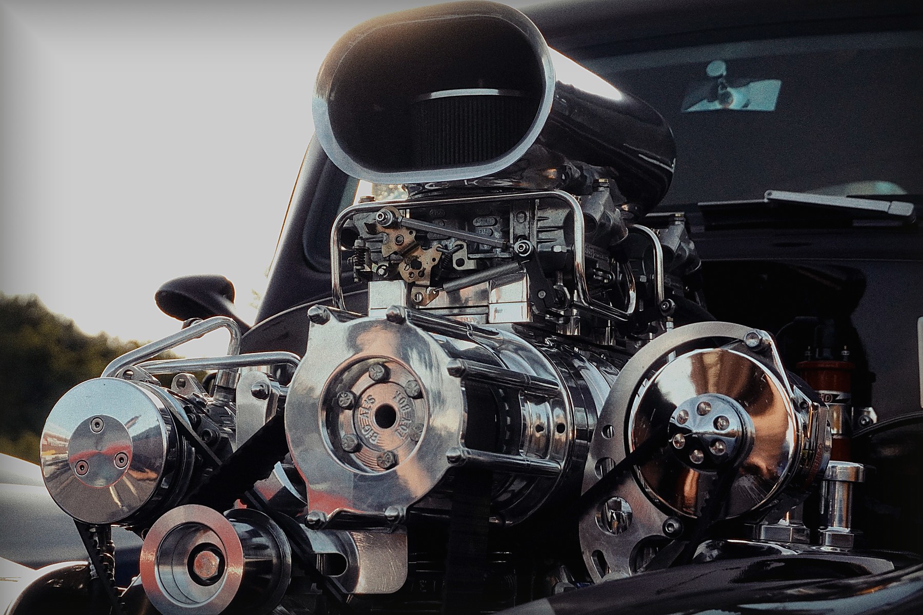 Close view of a V8 engine inside a classic car